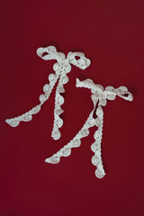 Rewards earings in White