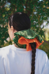 An orange crochet band
