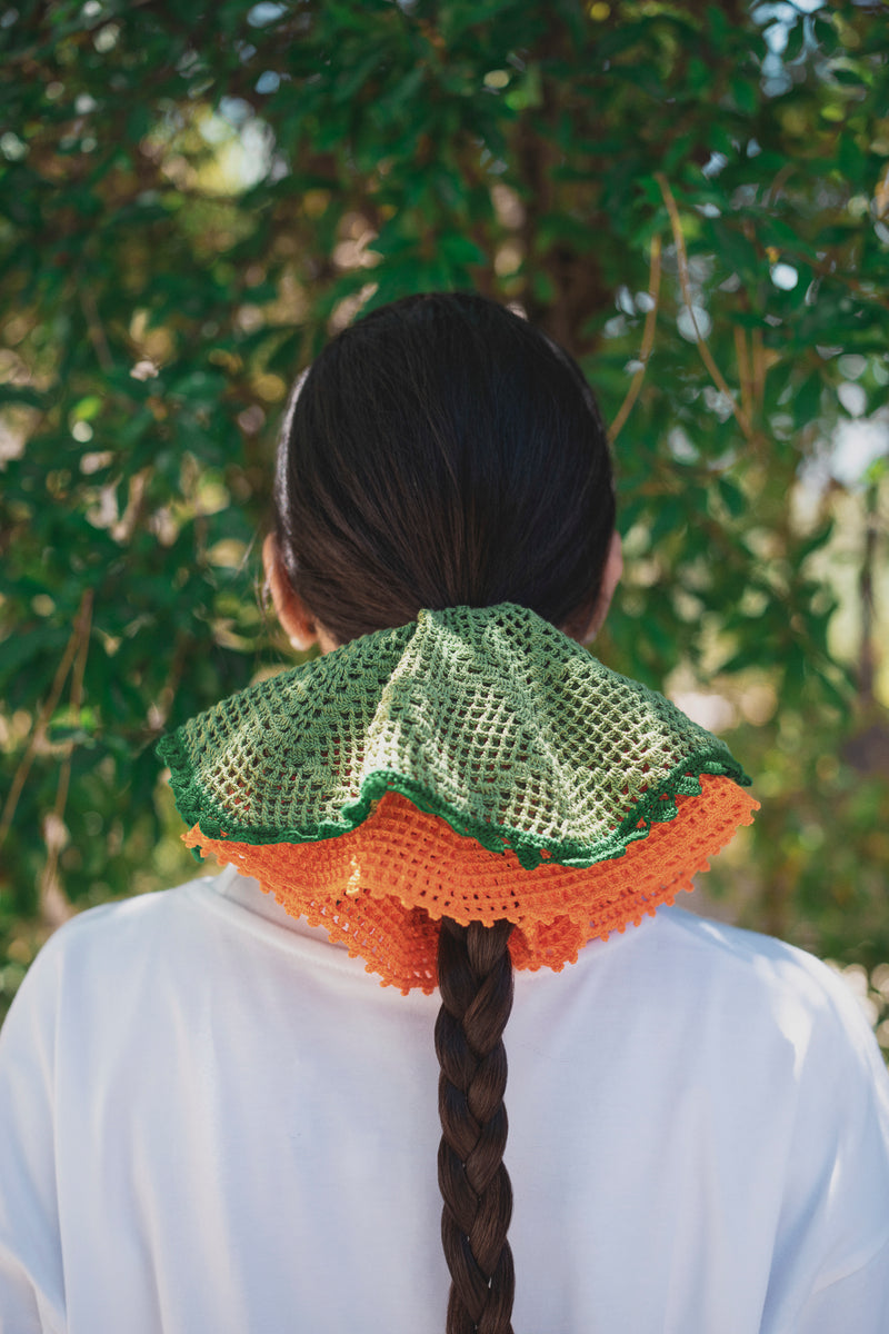 An orange crochet band