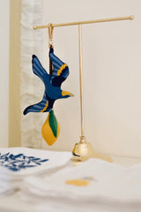 Migrating bird charm